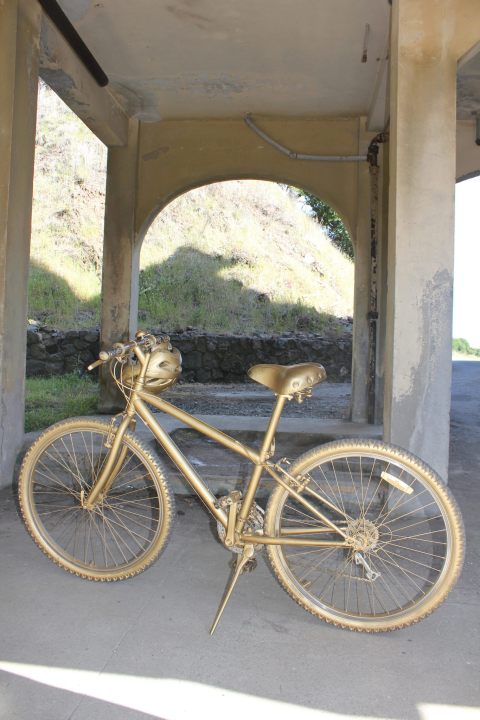 This is another mix of tangible and intangible heritage. This the golden bicycle of Hermes, the Messenger as used in the site-specific production of The Odyssey by WePlayers in 2012 on Angel Island in the SFBay. Here it rests in the old military hospital courtyard, waiting for its cue